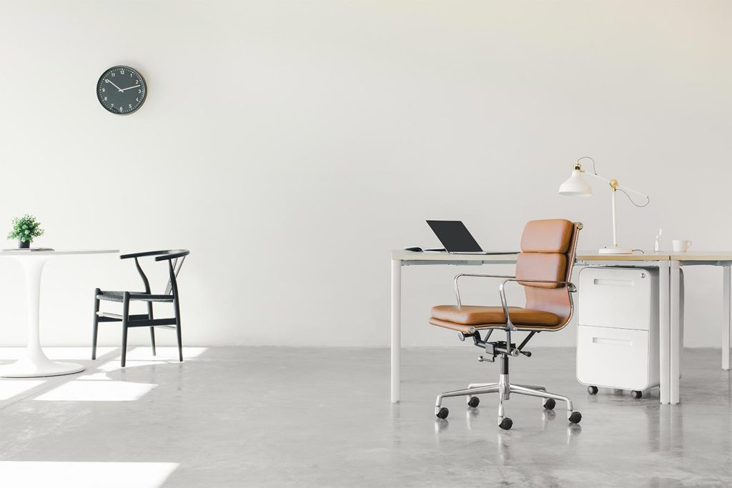 white office sace with brown leather chair spring clean