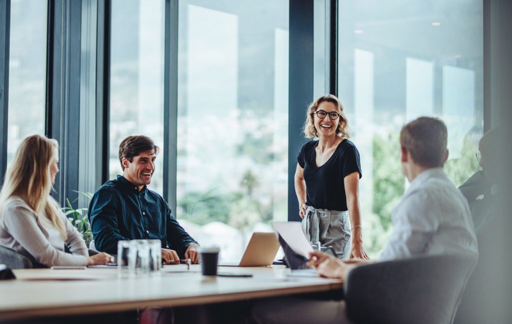 office meeting with woman smiling